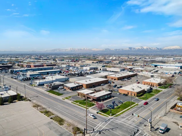 Aerial view of industrial structures and mountains