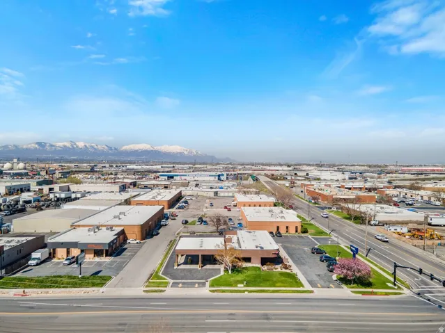 Bird's eye view of mountains and an industrial area