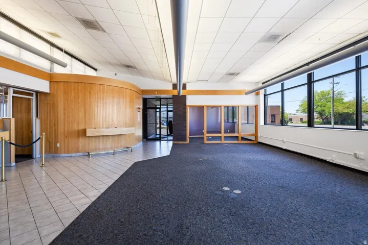 Community lobby featuring wood walls