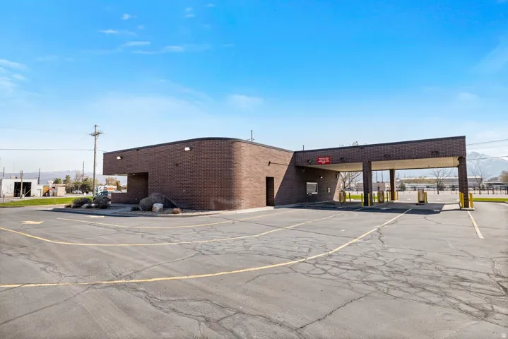 View of parking / parking lot featuring a mountain view