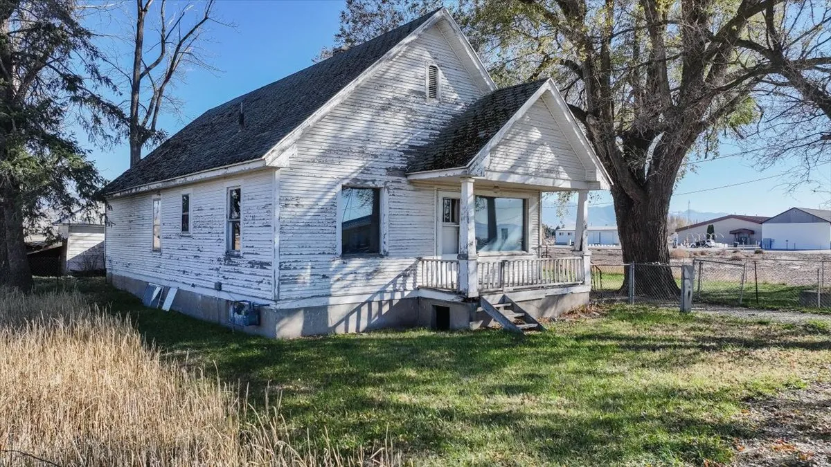 View of front of house with a gate