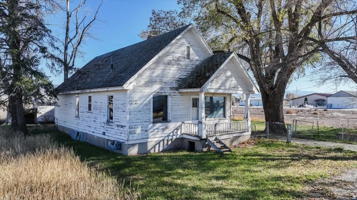 View of front of house with a gate