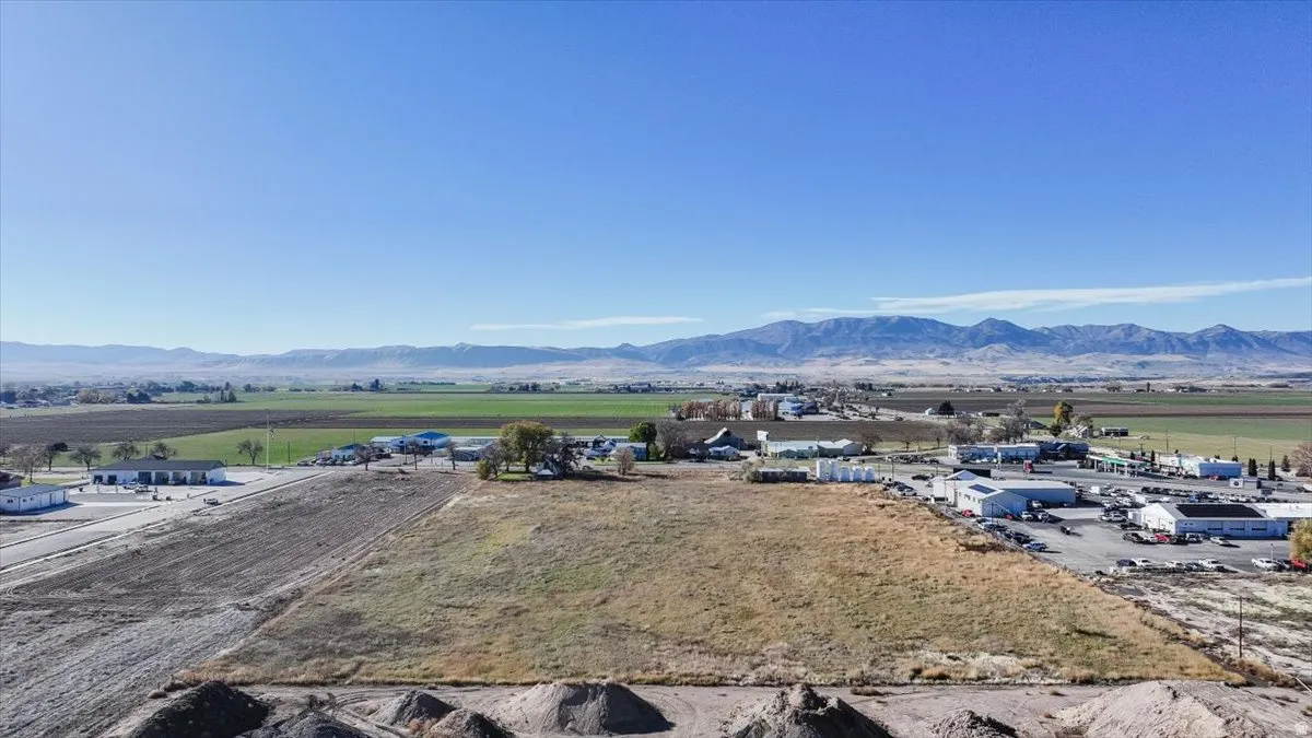 View of mountain backdrop with an industrial area