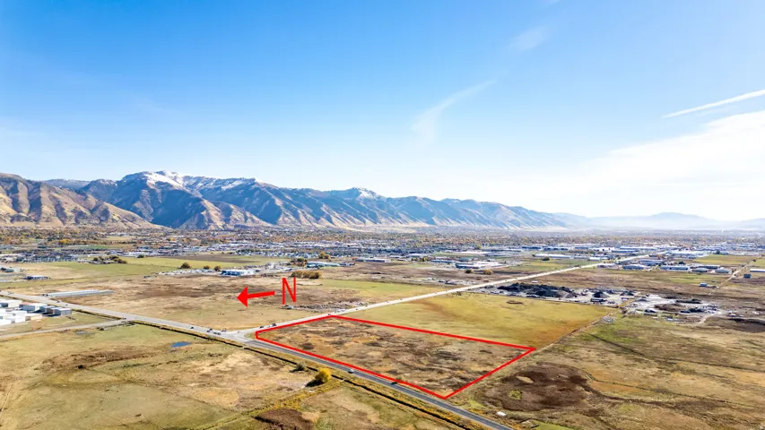 View of rural area with property parcel outlined and a mountainous background