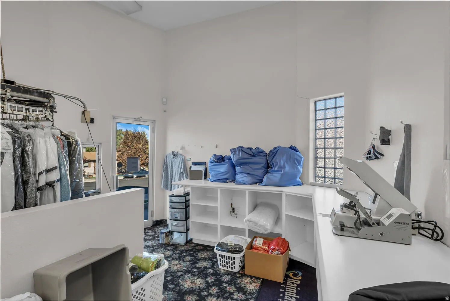 Walk in closet featuring a high ceiling