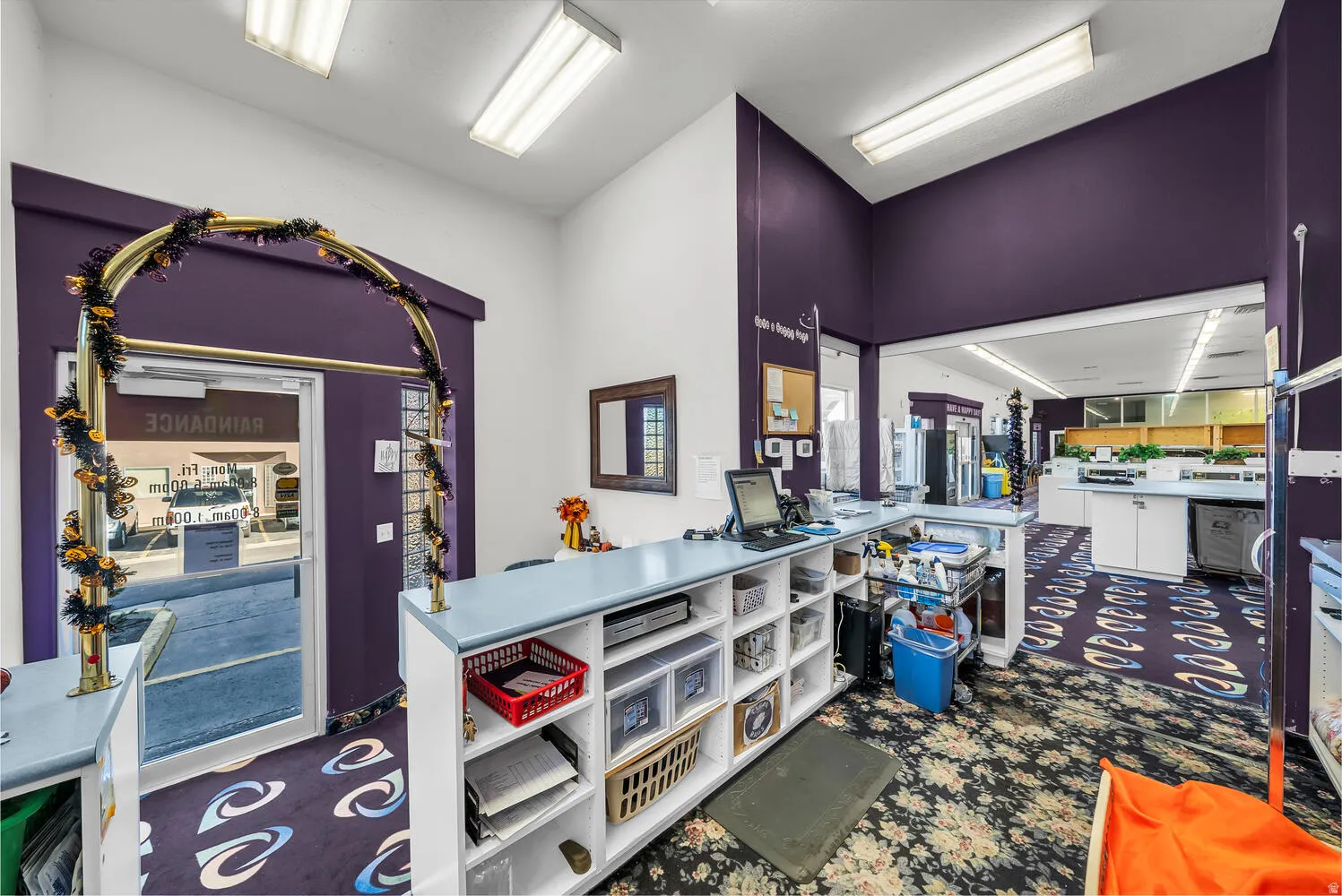 Kitchen with light countertops and open shelves