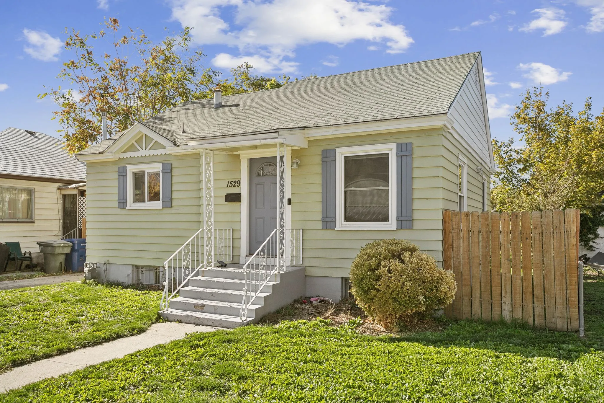 Bungalow-style home featuring roof with shingles