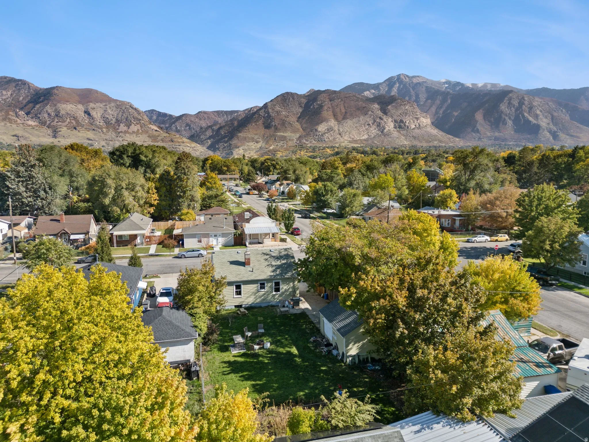 View of mountain background featuring nearby suburban area
