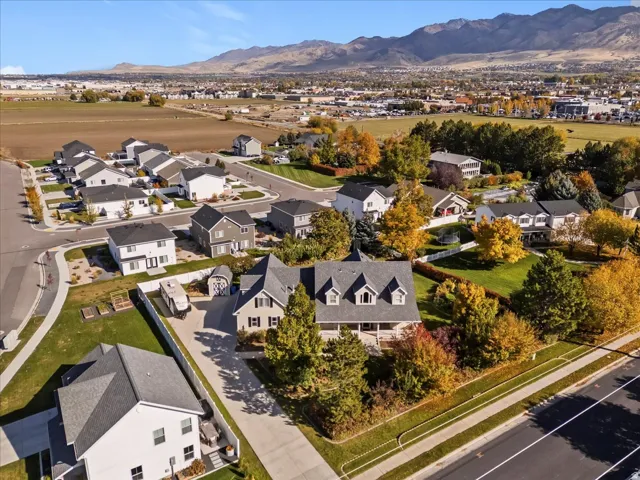 Aerial view of residential area featuring mountains