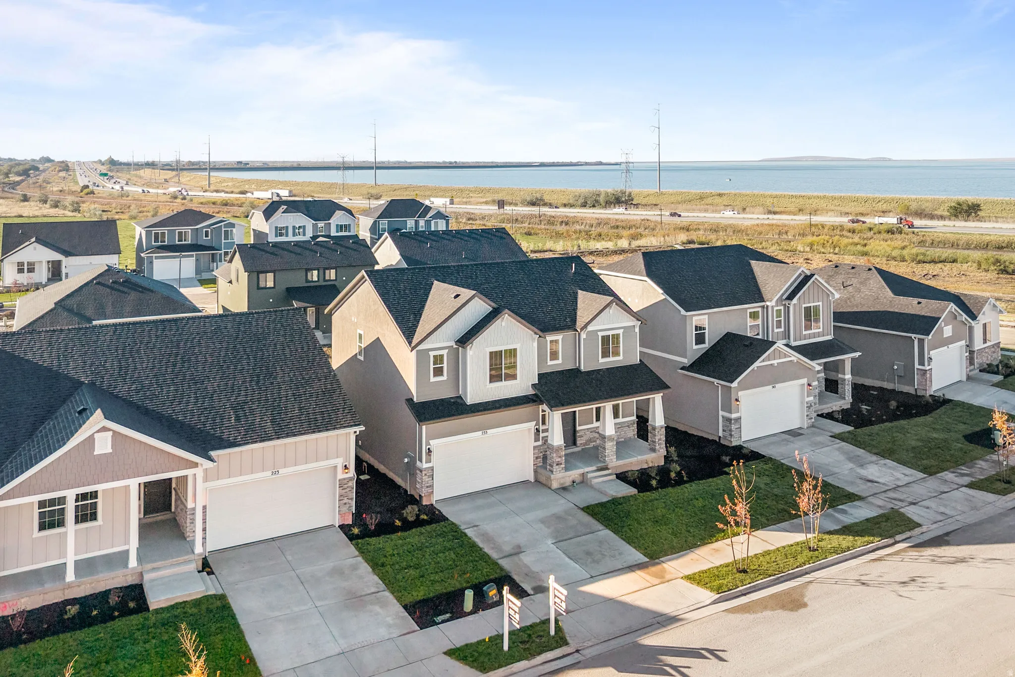 Aerial view of residential area with a large body of water