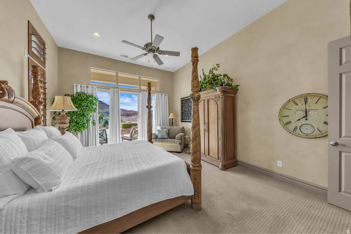 Bedroom featuring carpet floors, access to exterior, recessed lighting, a ceiling fan, and a mountain view