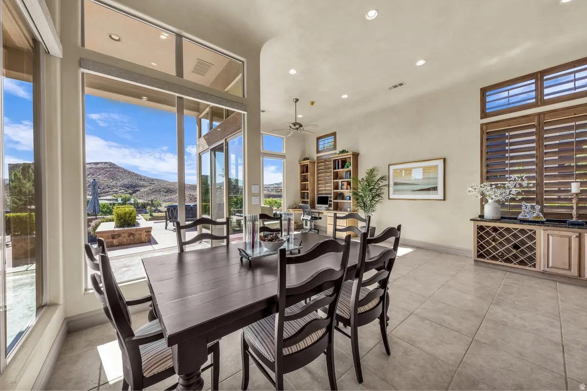 Dining area featuring recessed lighting, light tile patterned floors, plenty of natural light, and ceiling fan