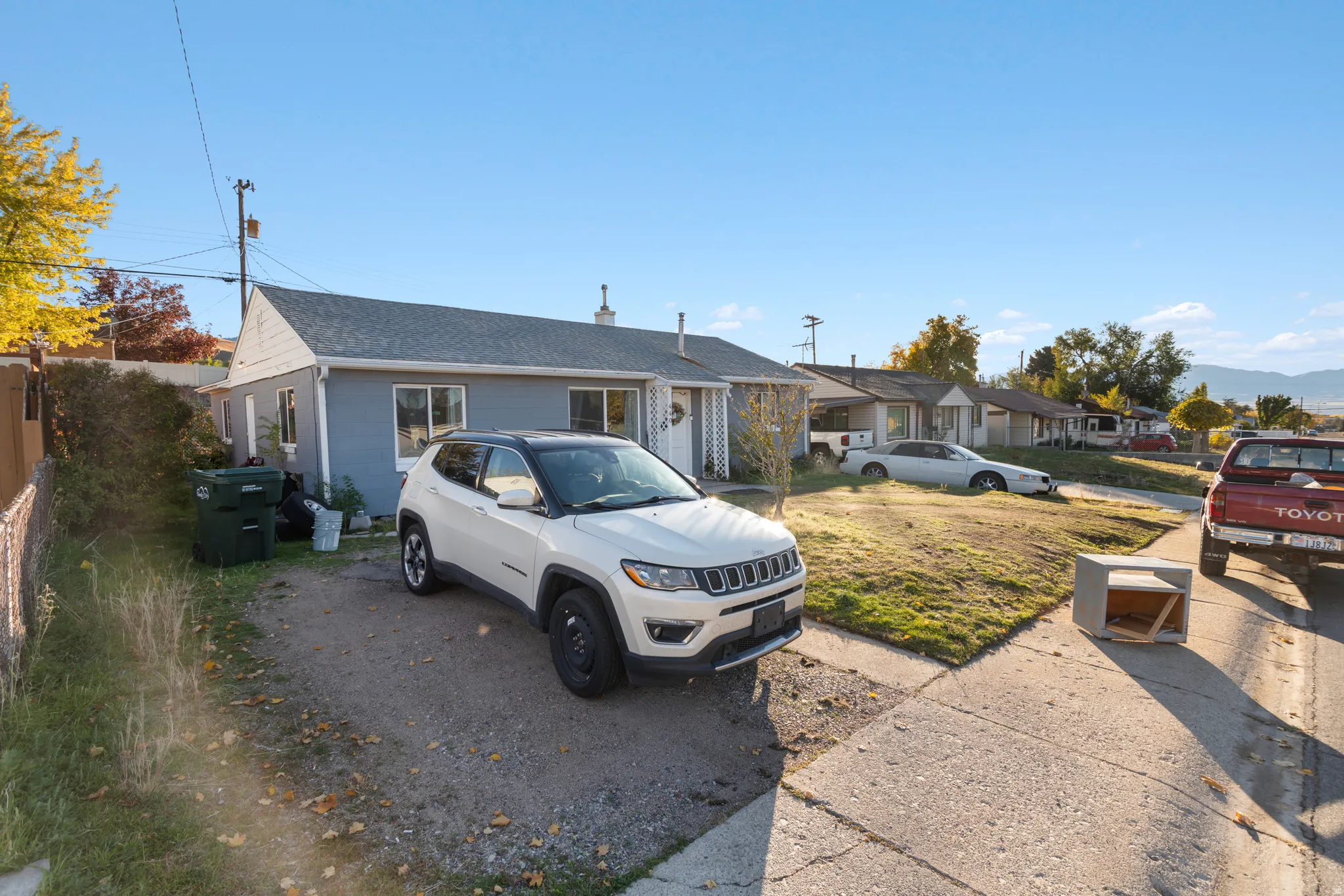 View of front of home featuring roof with shingles