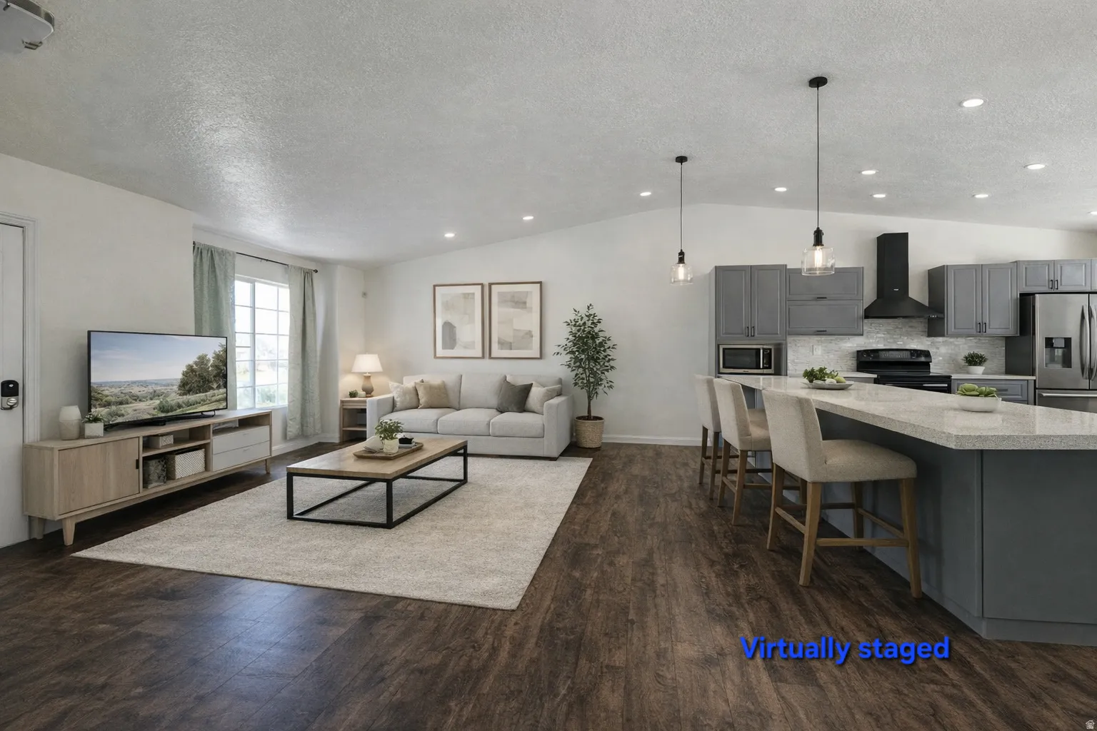 Living area featuring dark wood-type flooring and recessed lighting