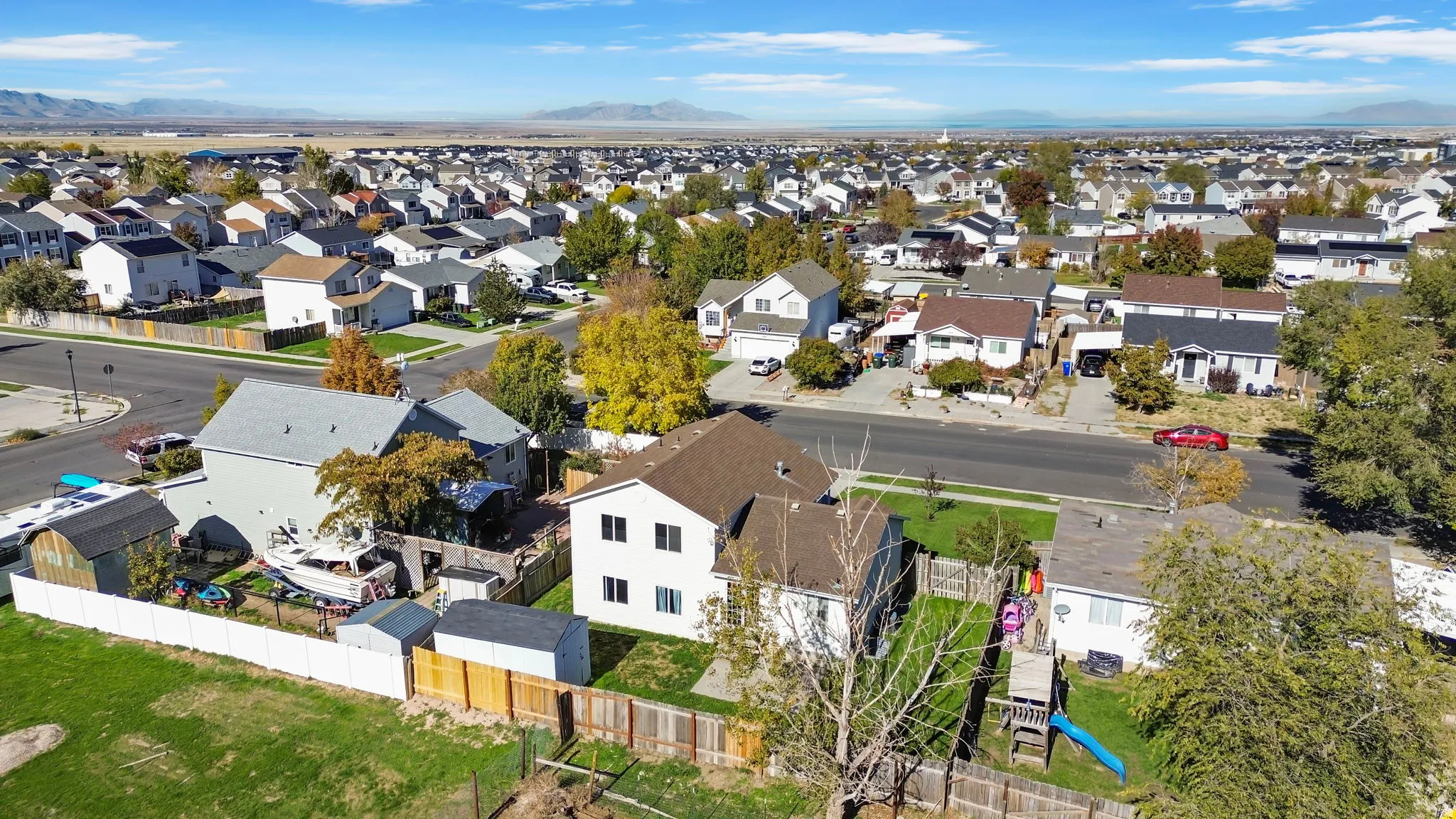 Aerial view of residential area with mountains