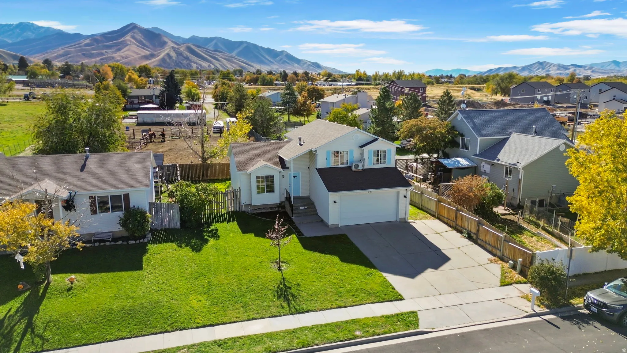Aerial view of residential area with a mountain backdrop
