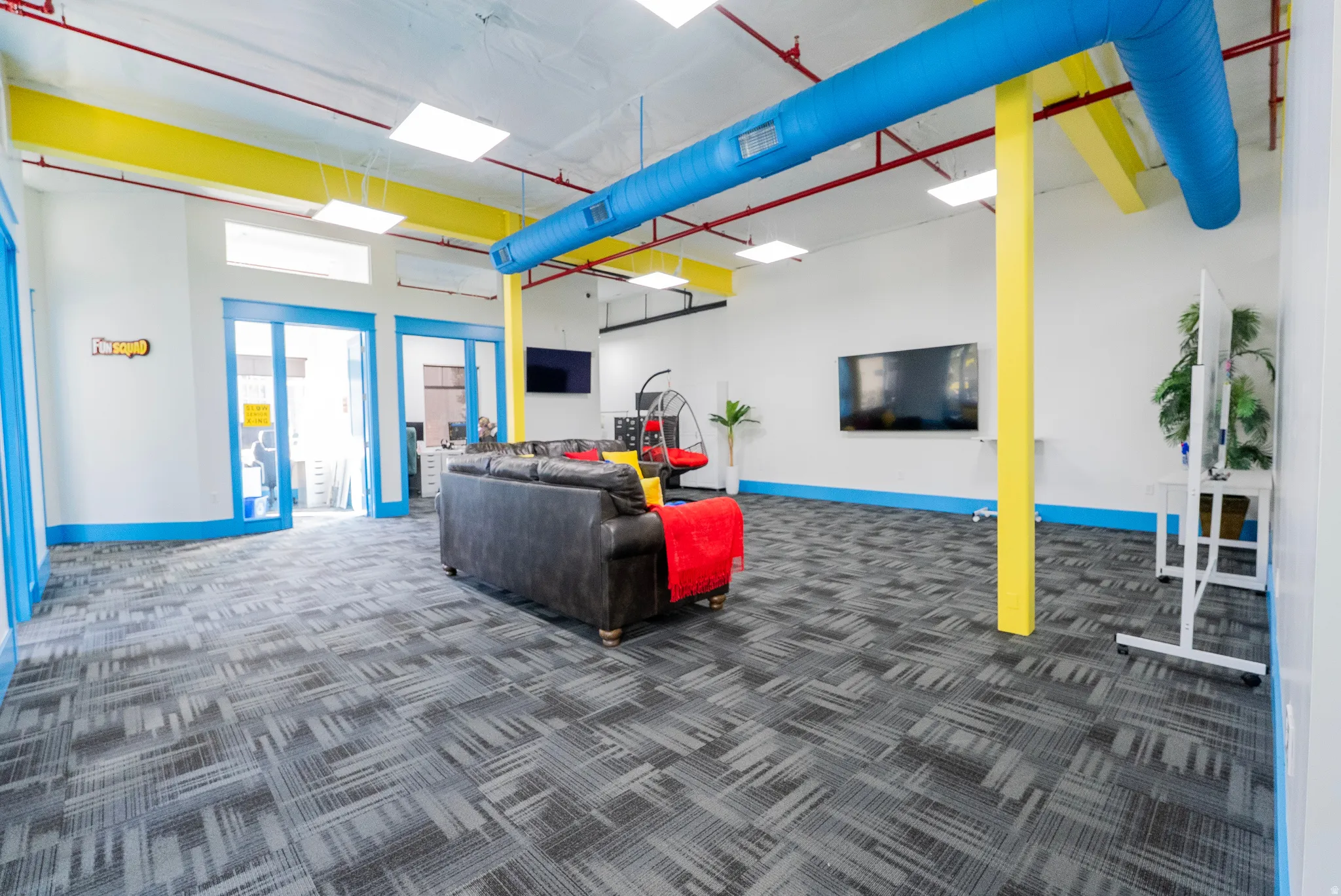 Lobby with dark colored carpet