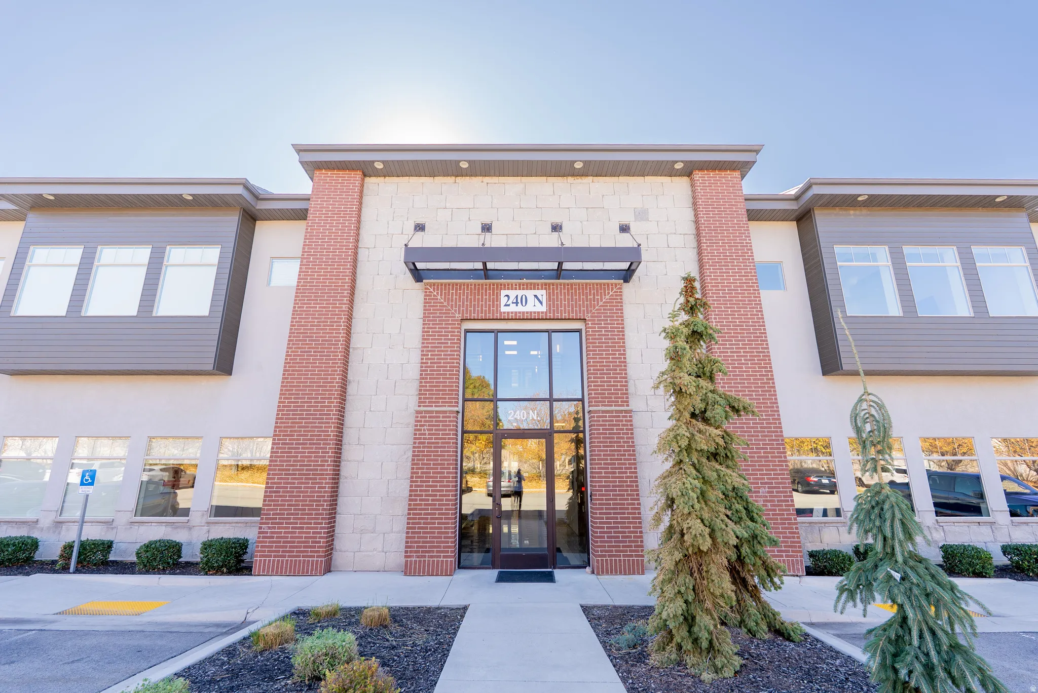 Property entrance with brick siding