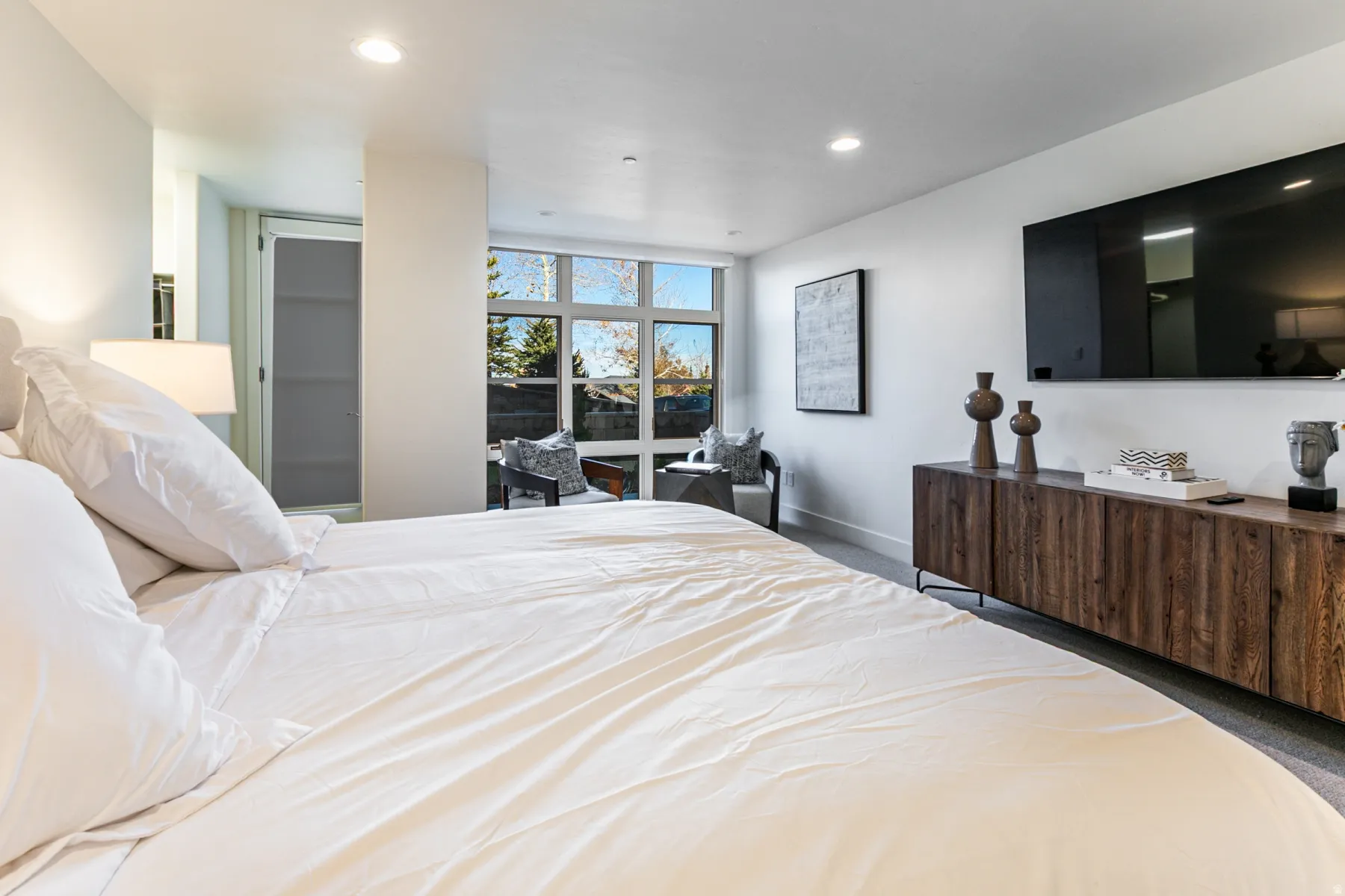 Bedroom with recessed lighting and carpet floors