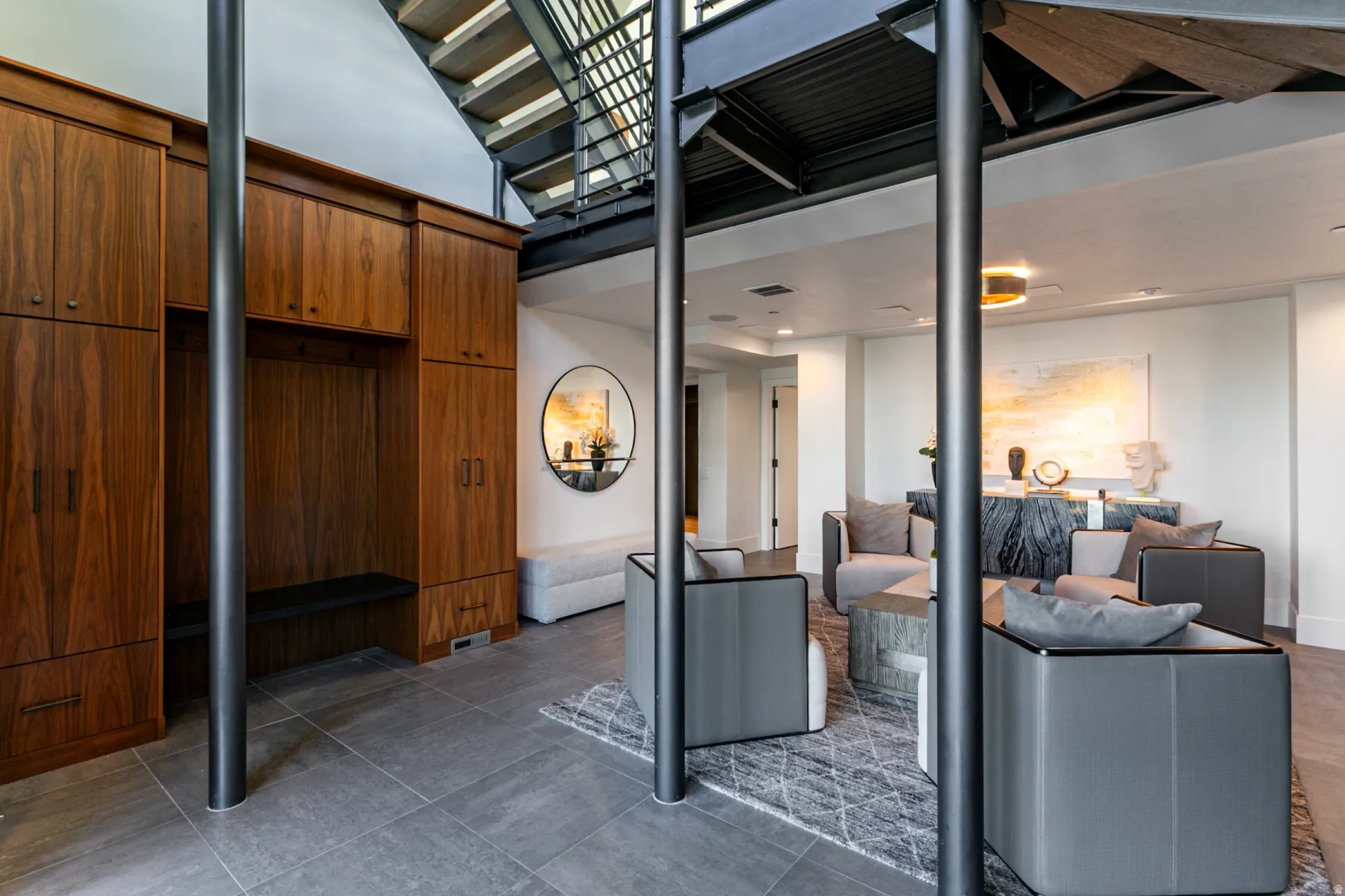 Living area featuring a high ceiling