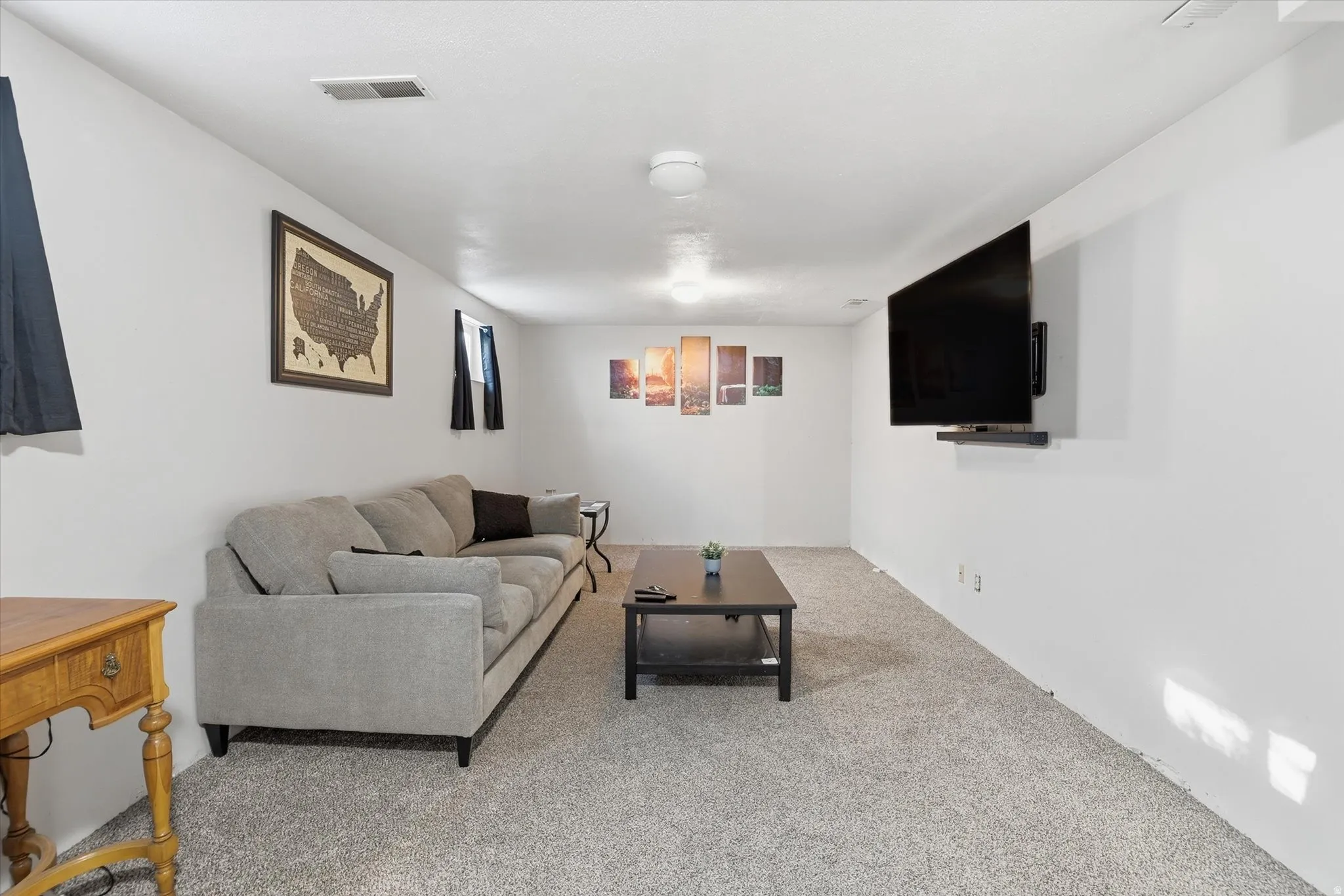 Living room featuring carpet floors