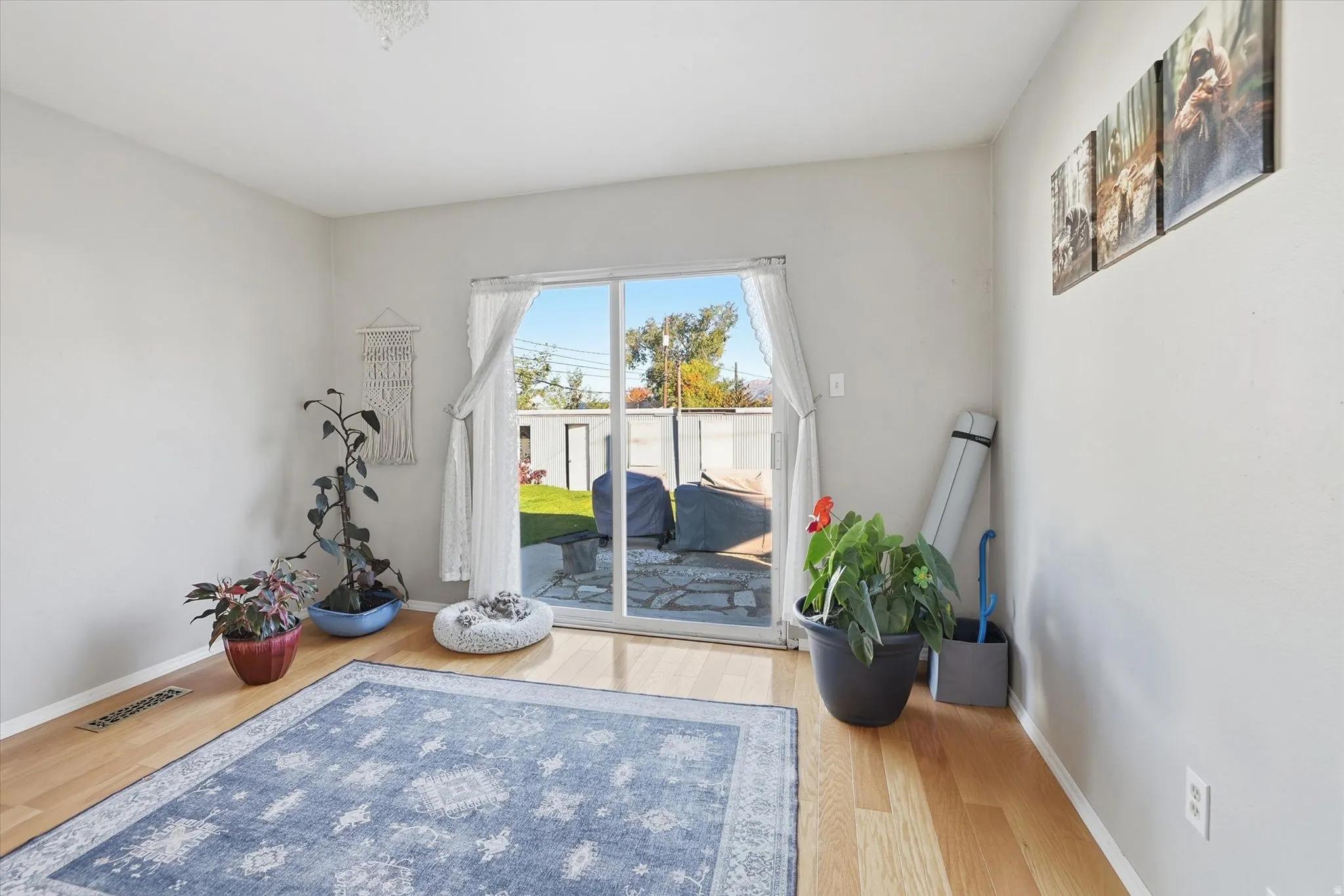 Living area featuring wood finished floors and baseboards
