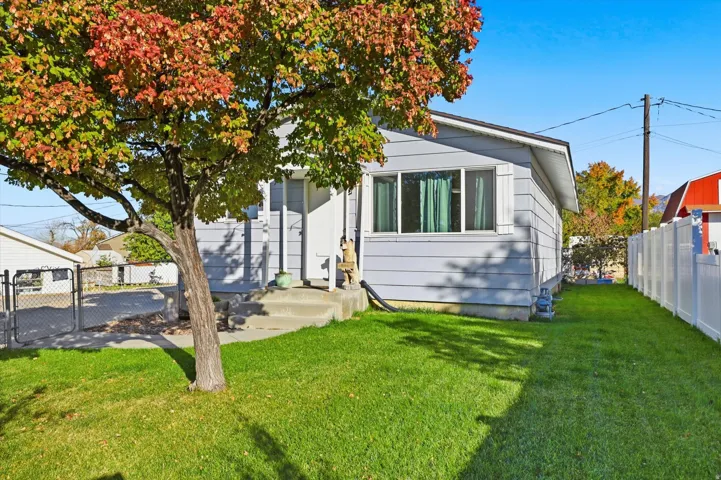 Bungalow-style home featuring a gate