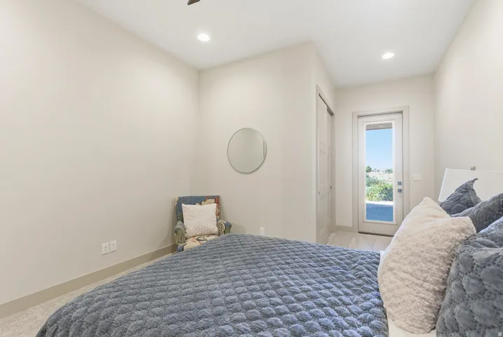 Carpeted bedroom with recessed lighting, access to exterior, and a ceiling fan