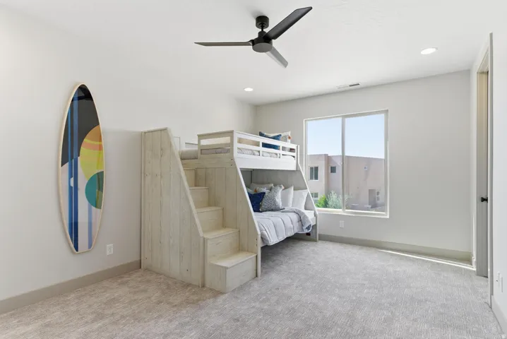 Bedroom with carpet, a ceiling fan, and recessed lighting