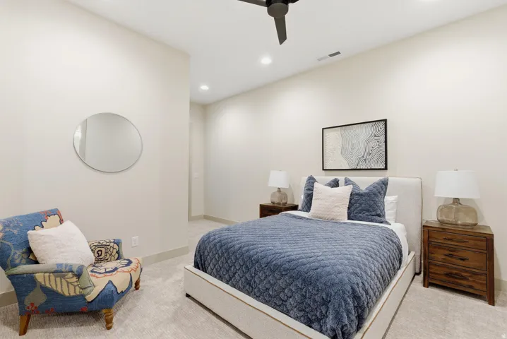 Bedroom with recessed lighting, light carpet, and a ceiling fan