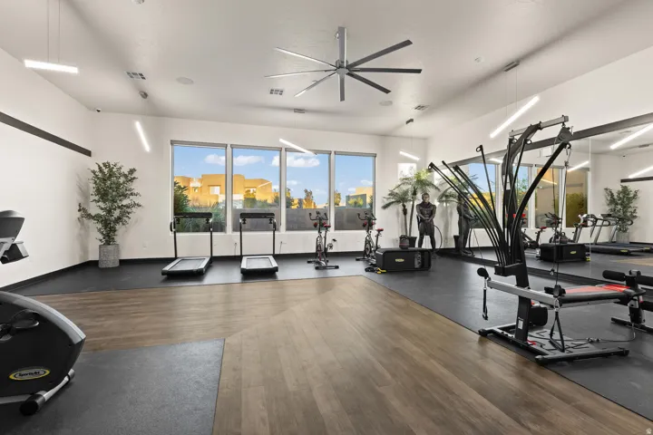 Exercise room featuring a ceiling fan