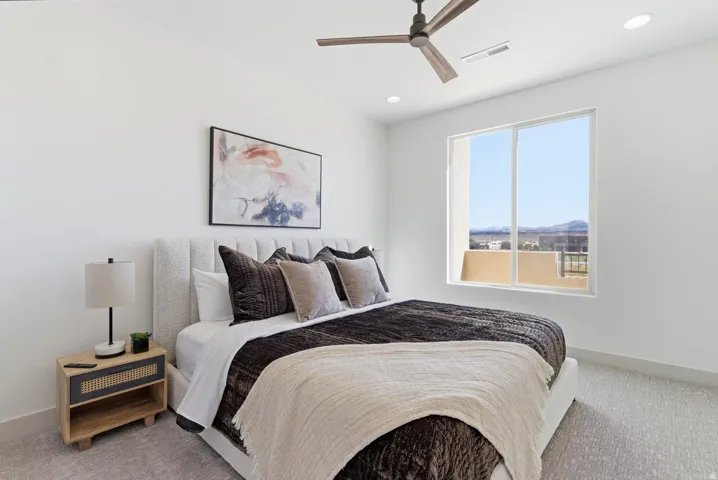 Bedroom featuring carpet floors, a ceiling fan, and recessed lighting