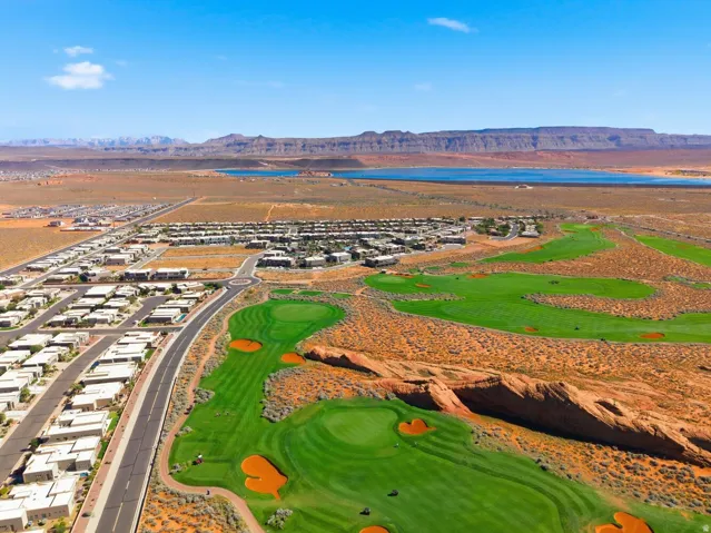 Aerial view of residential area featuring a water and mountain view