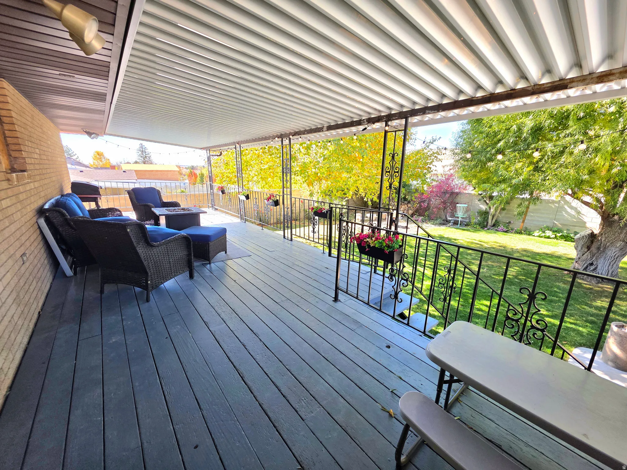 Deck featuring a yard and outdoor lounge area