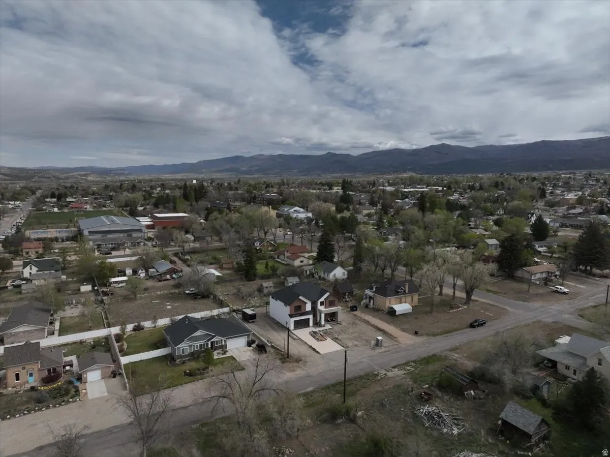 Aerial view of residential area with mountains