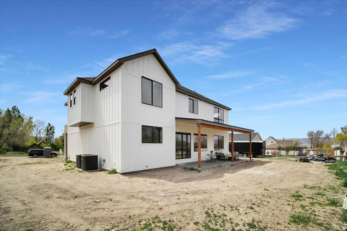 Rear view of house with a patio area