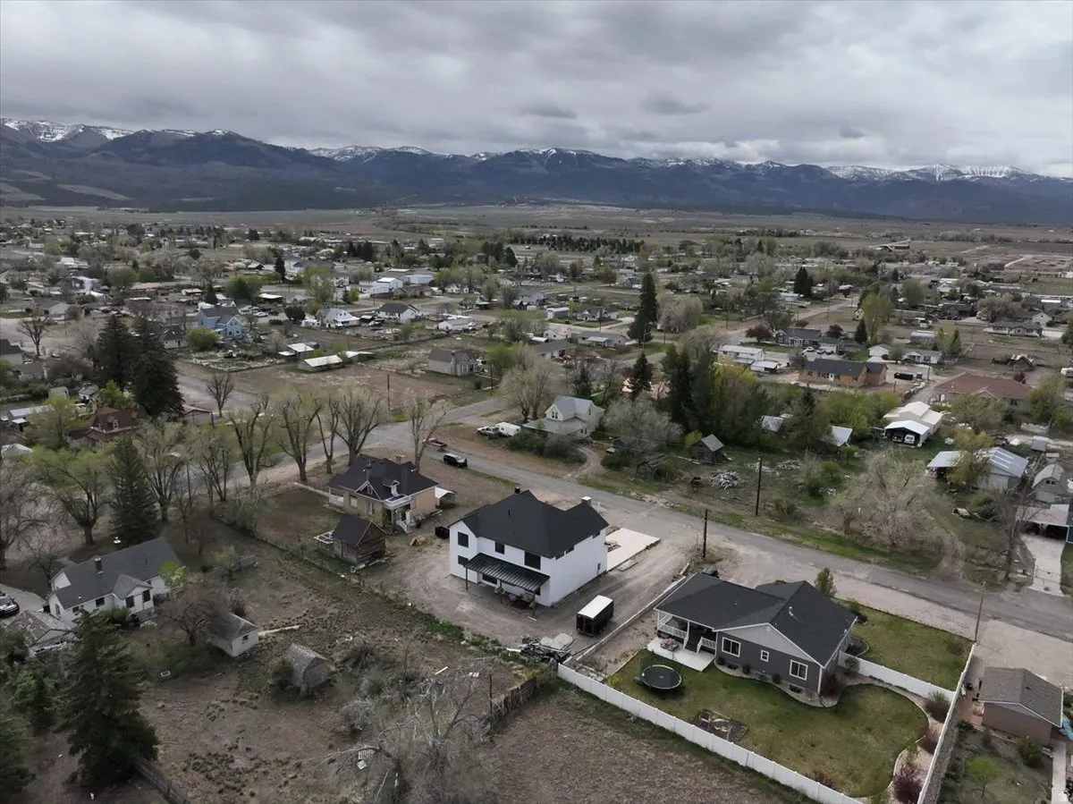 Aerial view of residential area with a mountain backdrop