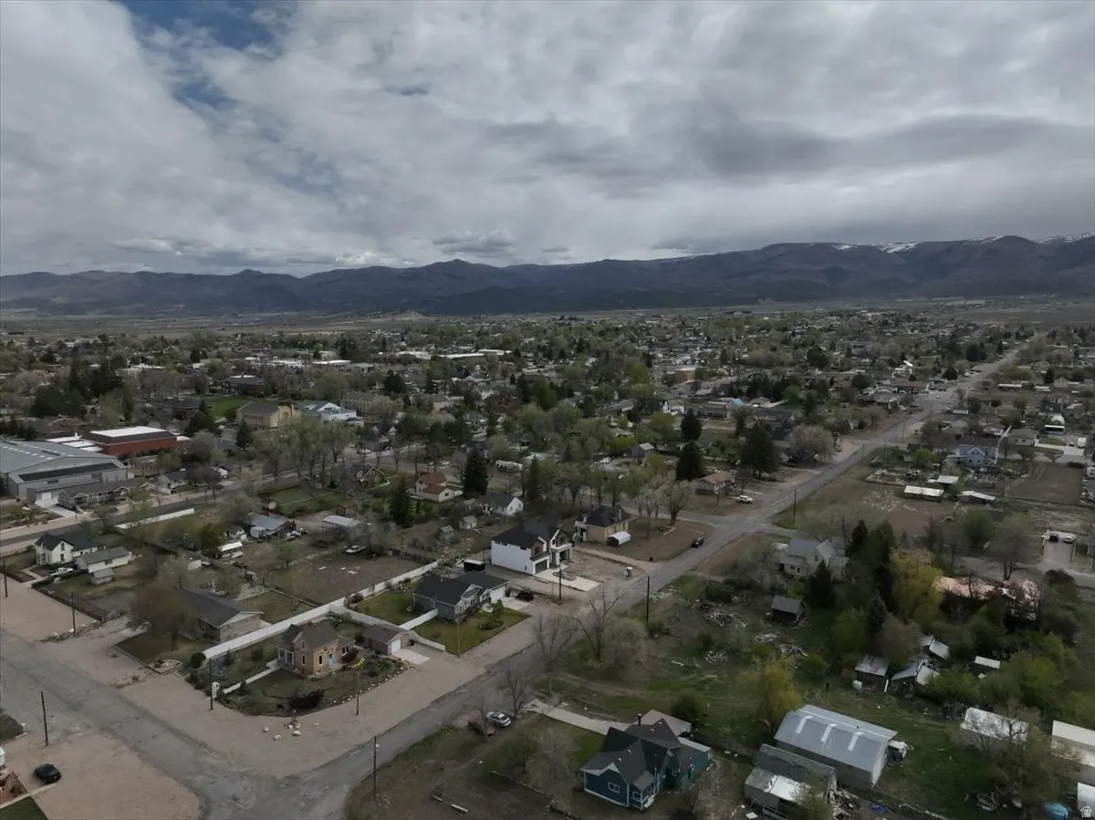 Aerial view of residential area with a mountain backdrop