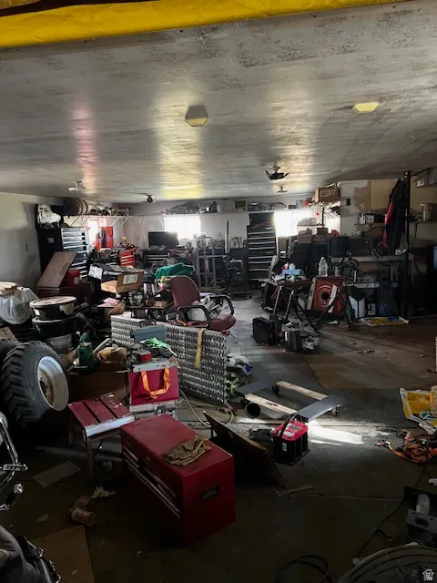 Garage featuring a workshop area