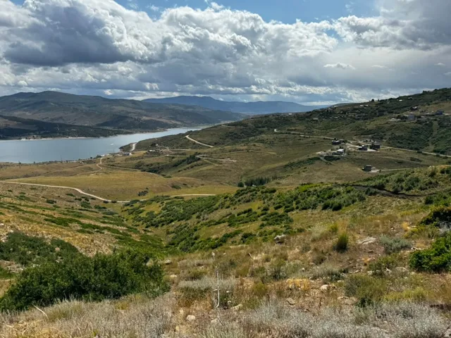 Mountain view featuring a nearby body of water