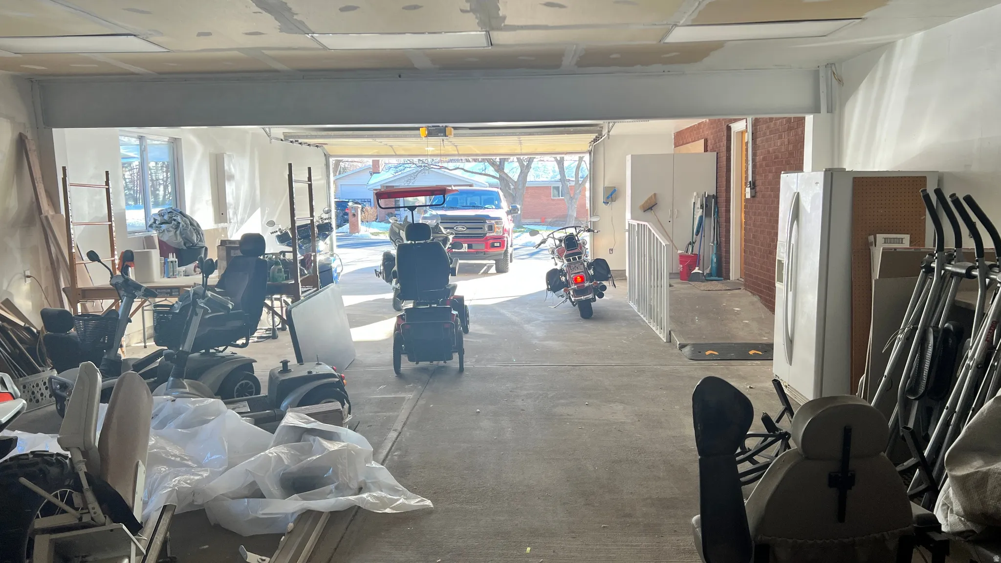 Garage with fridge with ice dispenser