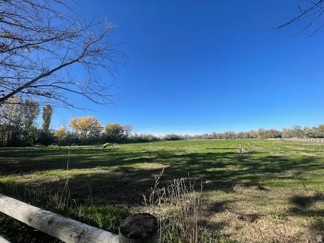 View of grassy yard with a view of countryside