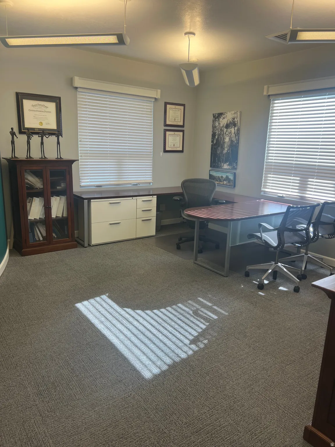 Office featuring dark colored carpet