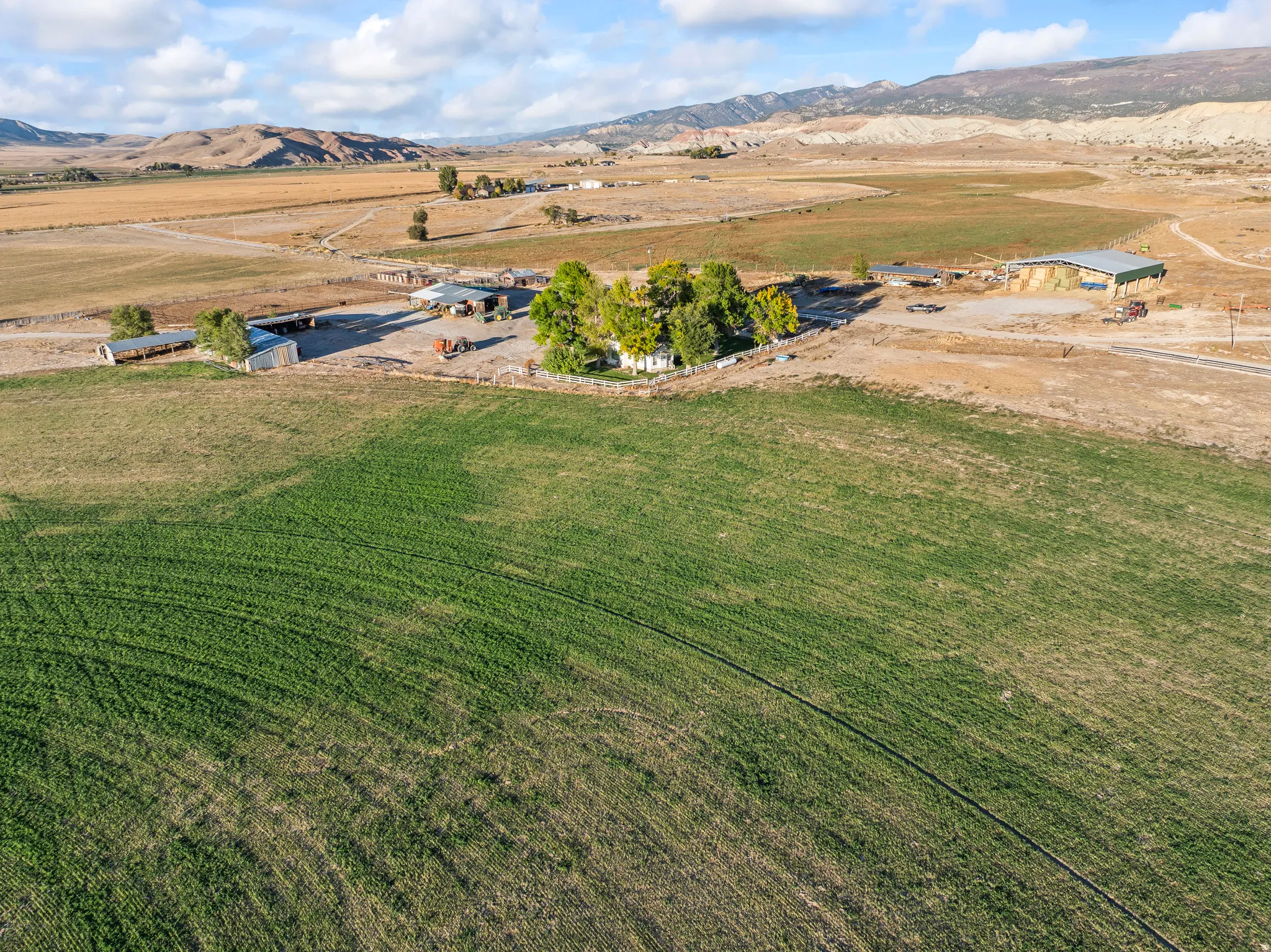 Overview of rural landscape featuring a mountain backdrop