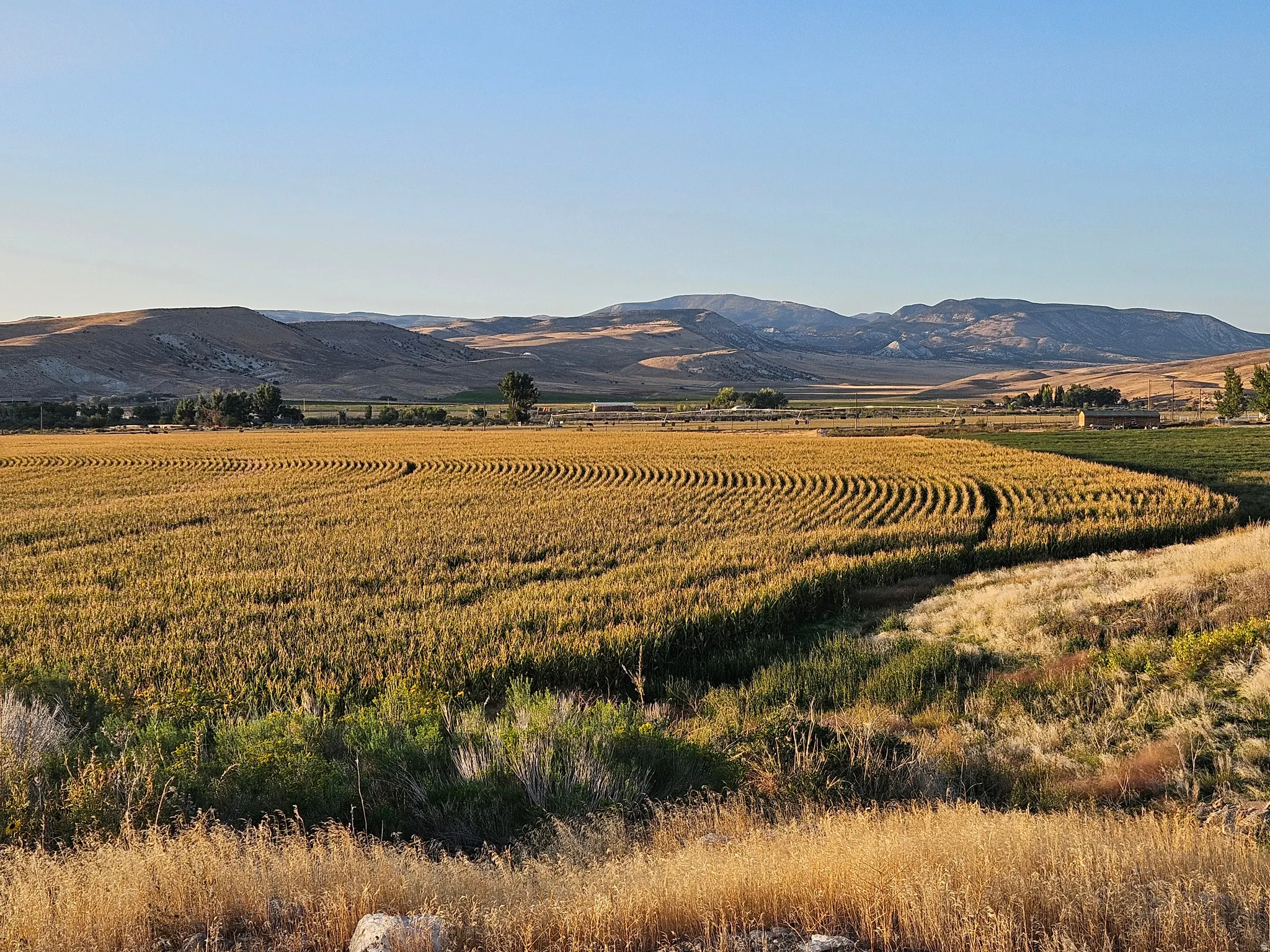 View of mountain background featuring rural landscape and abundant farmland