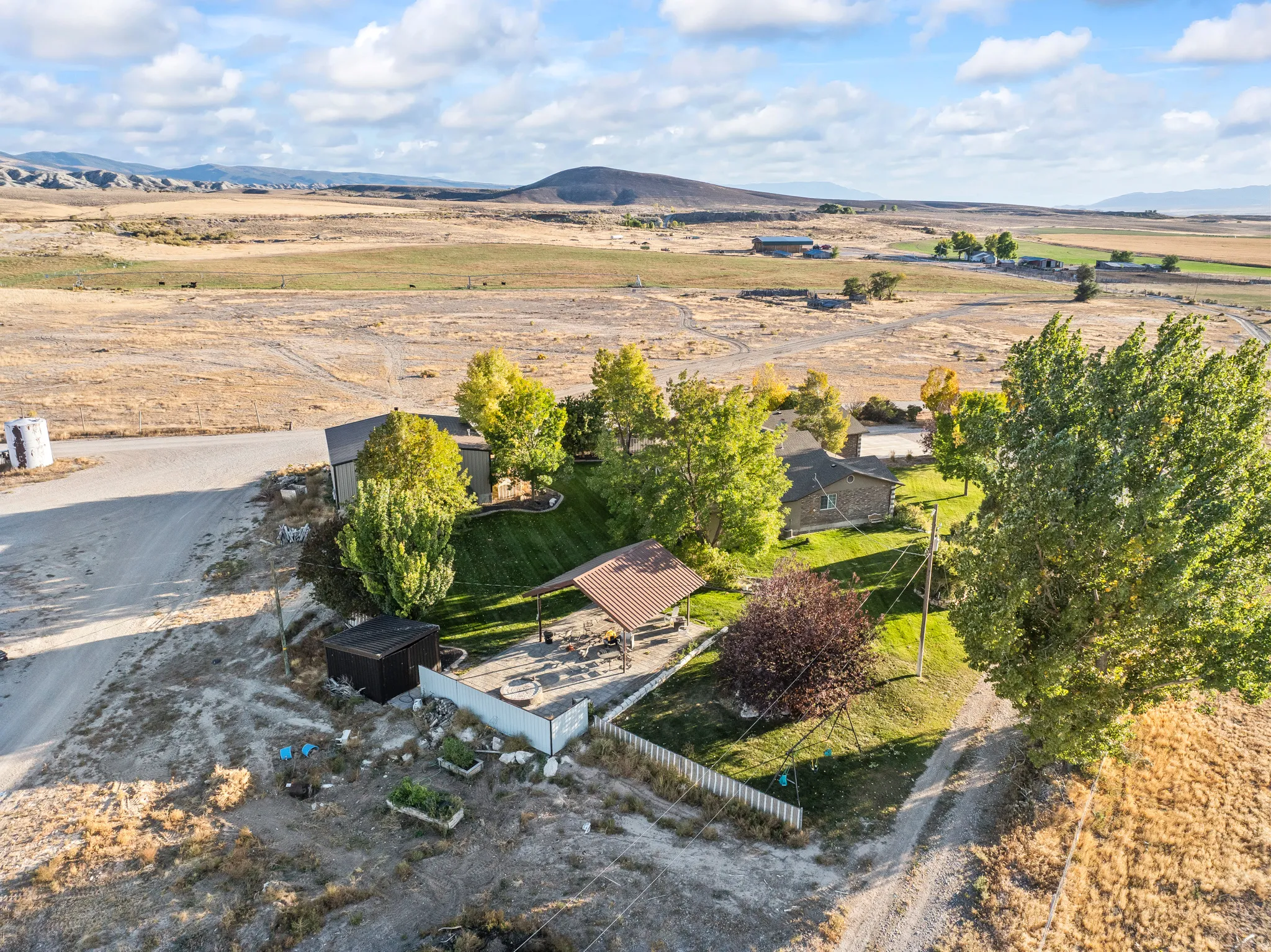 Aerial view of sparsely populated area featuring a mountain backdrop