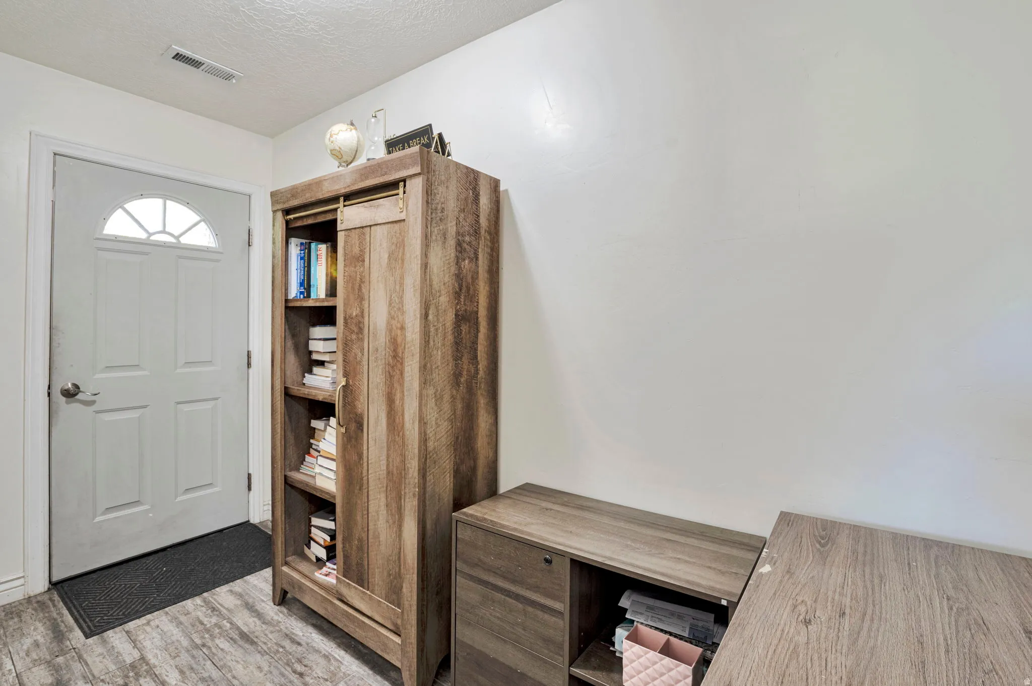 Mud room leading to the backyard.