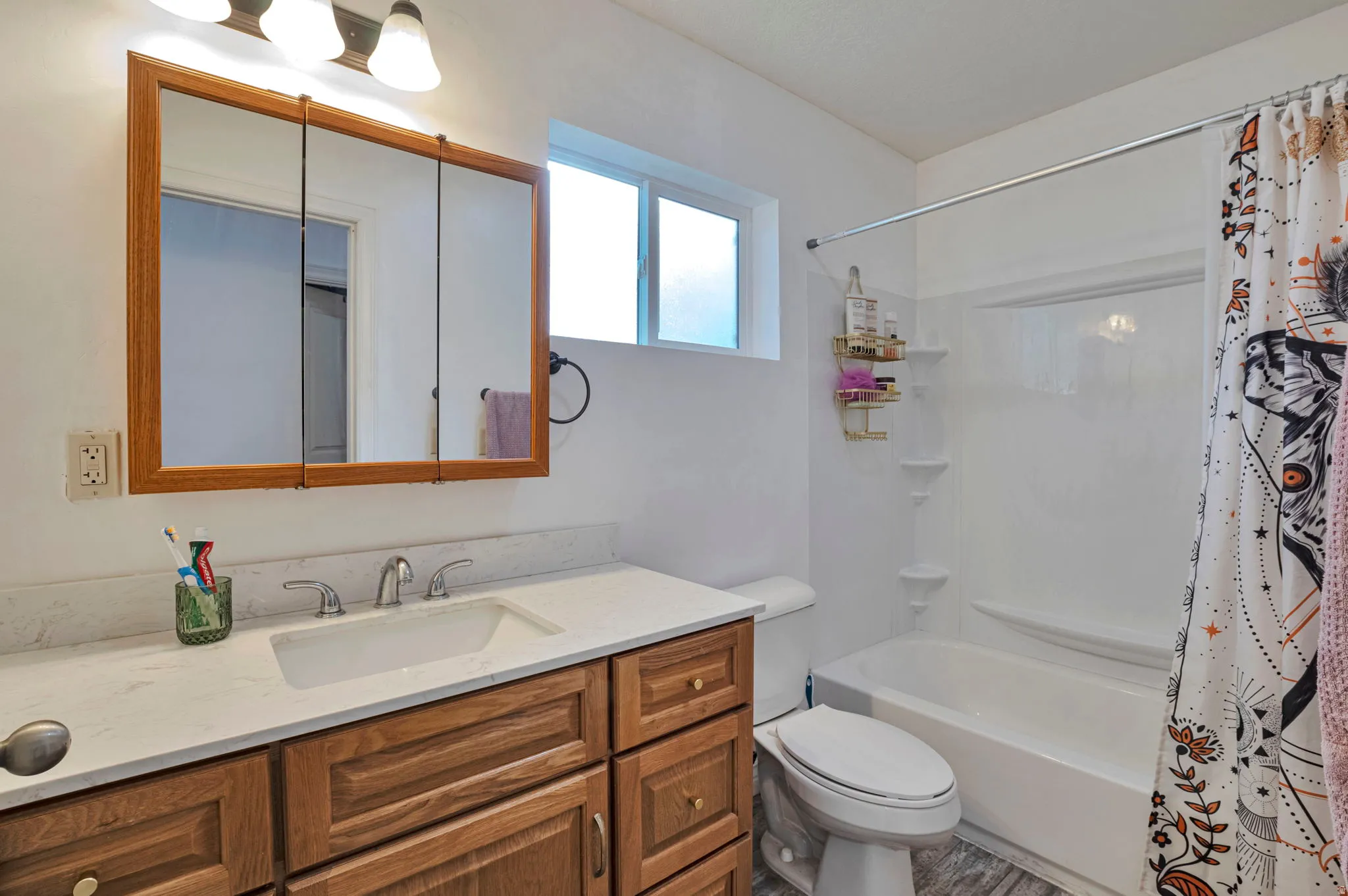 Full bath with vanity and shower / bathtub combination with curtain