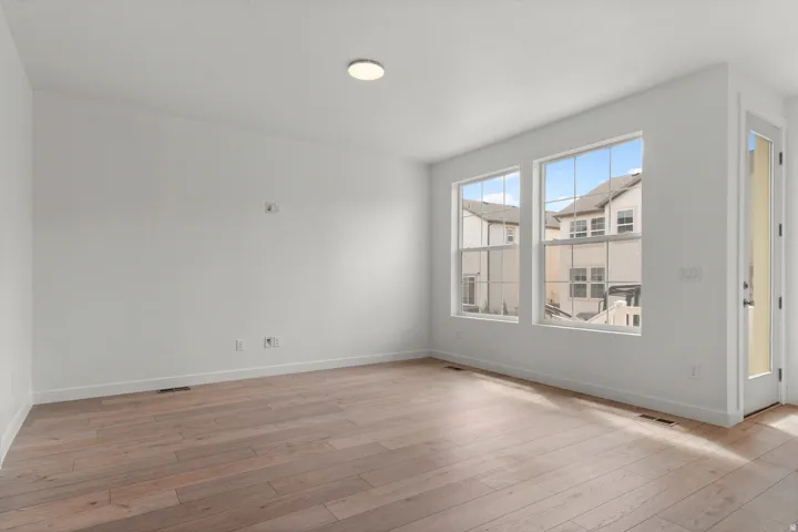 Spare room with light wood finished floors
