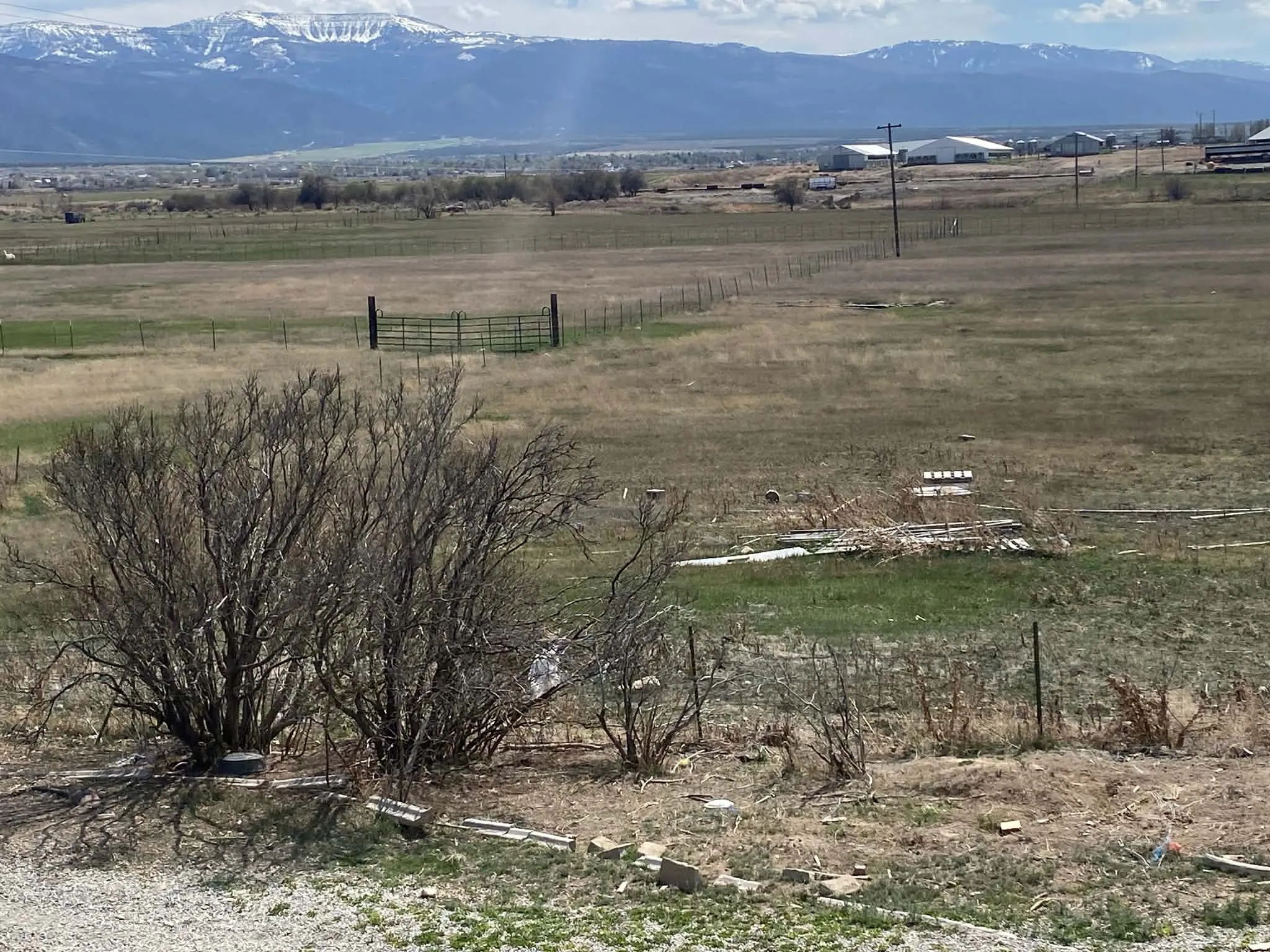 View of mountain backdrop featuring rural landscape